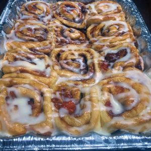 One dozen fresh peach pie cinnamon rolls from My Table of Three.